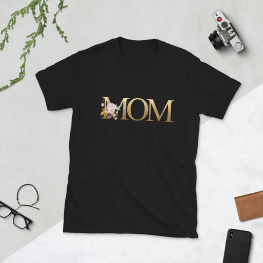 Short-Sleeve Black T-Shirt on a white table-top with Gold Glitter Ombre 'MOM' Graphic 